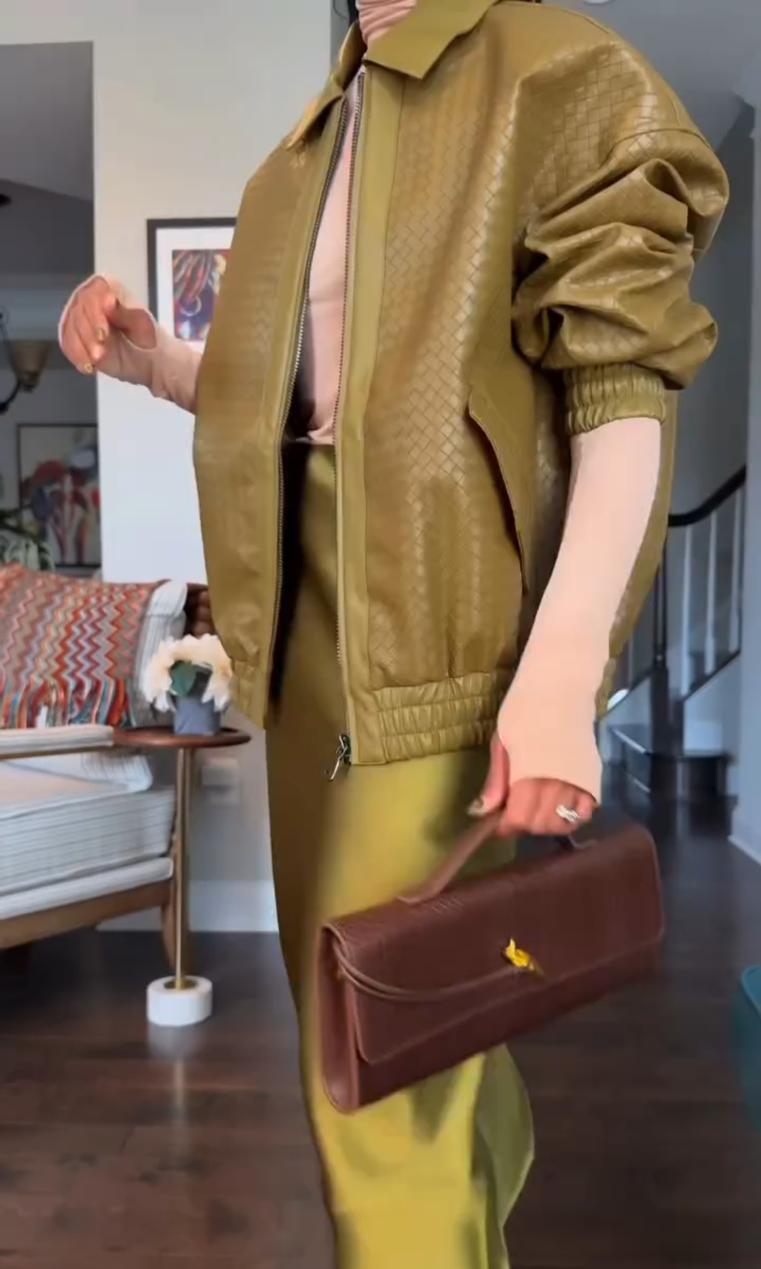 Olive green textured leather zip-up jacket