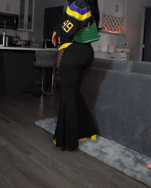 Black Lace-Up Cutout Flared Pants with Grommet Details