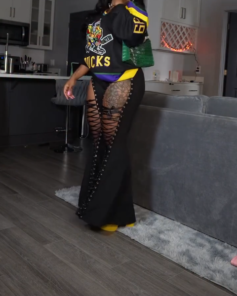 Black Lace-Up Cutout Flared Pants with Grommet Details