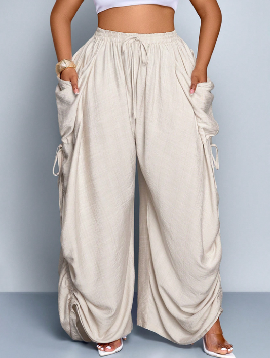 Plus Size Women Solid Color Tie-Waist Wide Leg Baggy Pants With Big Pockets